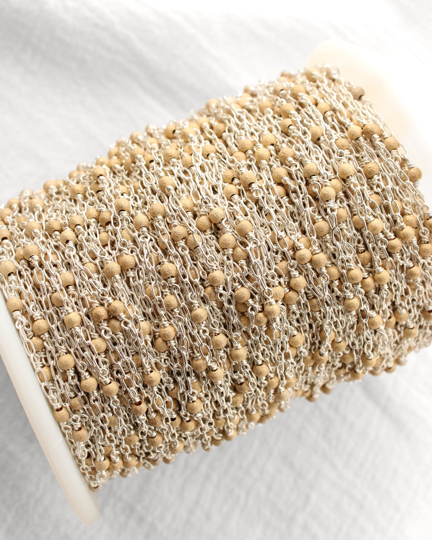 1.7mm Paperclip Chain with Gold Stardust Beads. M236