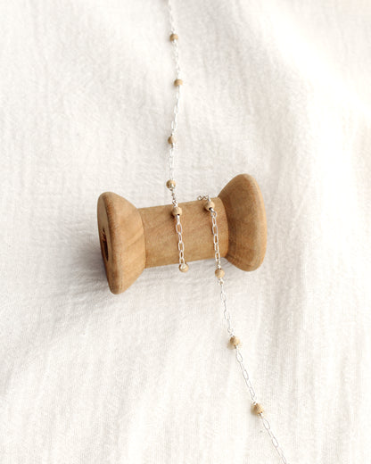 1.7mm Paperclip Chain with Gold Stardust Beads. M236