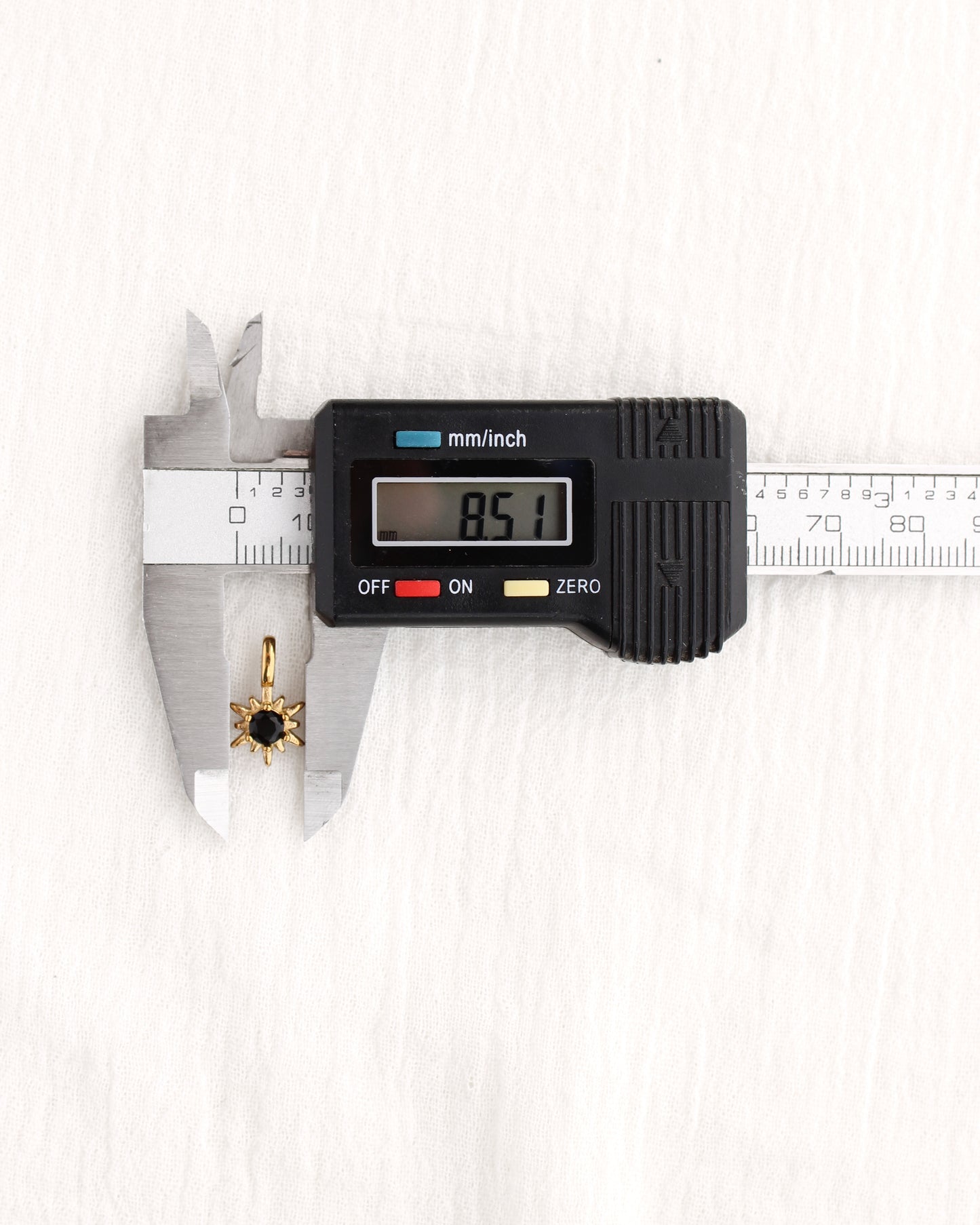 15mm Black Zircon Sunburst PVD Charm, CH369
