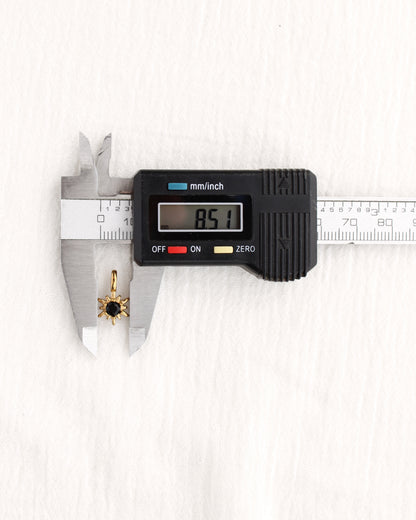 15mm Black Zircon Sunburst PVD Charm, CH369