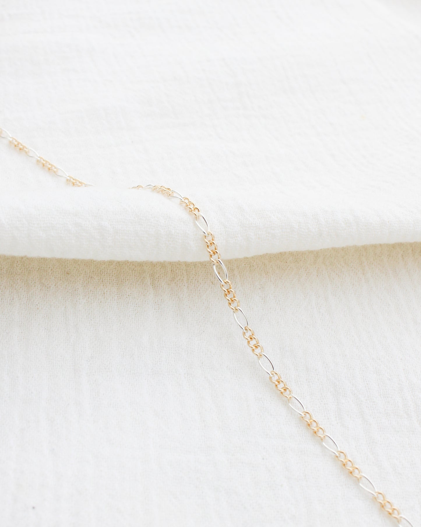 2.3mm Figaro Chain Silver w/ 3 Gold Links, M232