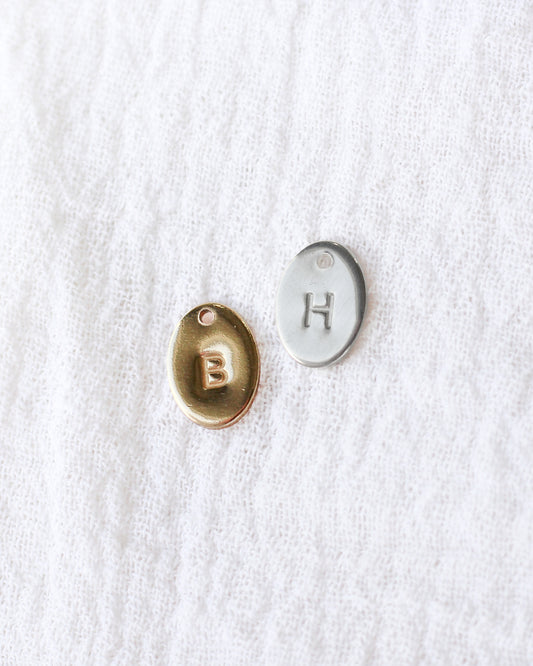 10x7mm Letter Oval Charm, CH244